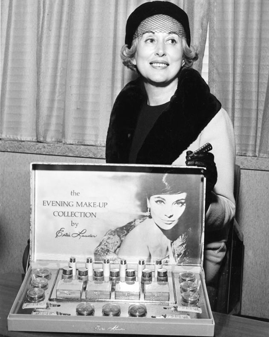 Woman holding a box of makeup