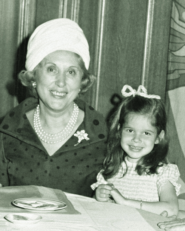 Older woman and young girl smiling